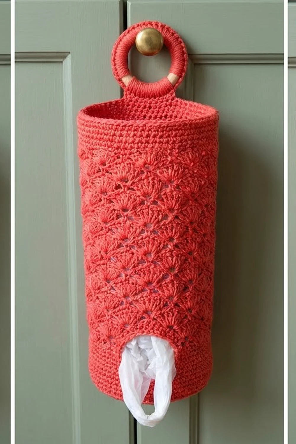 Coral crocheted tissue cozy with wooden ball handle mounted on sage green paneled door holding white tissue.