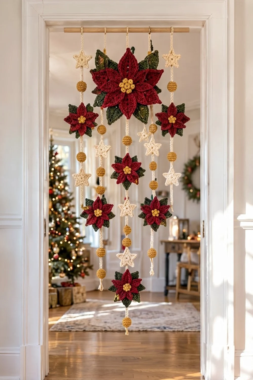Red crocheted poinsettias with cream stars and gold accents hang festively in a bright white doorway.